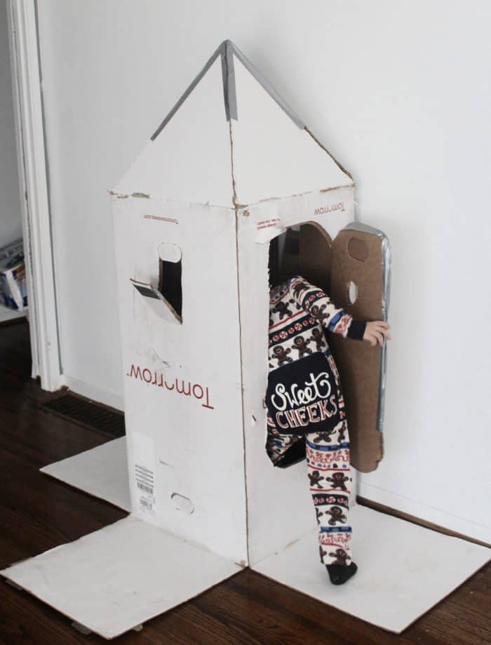 cardboard boxes used as toys or indoor toddler activities