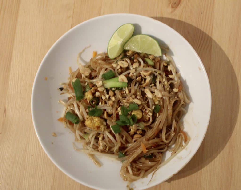 We make this authentic vegetarian pad thai recipe at home a LOT and it tastes like the restaurant. Learn how with step by step photos at www.blueandhazel.com. You can easily add meat too! 