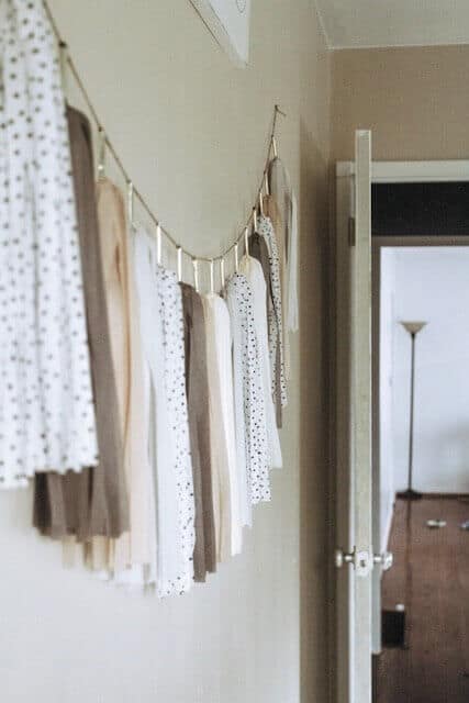 neutral tissue garland room decor hanging on a wall