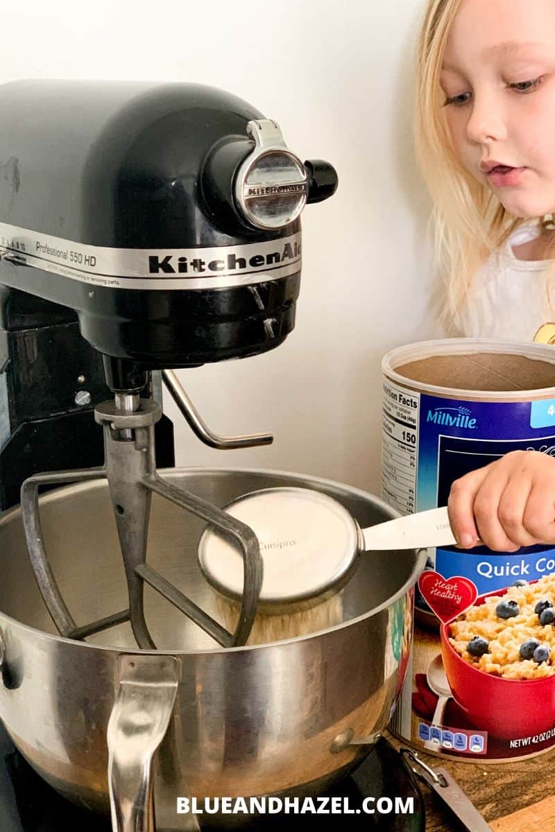 Mixing up peanut butter power balls in a kitchen aid takes 5 minutes and is the perfect kid friendly snack on the go!