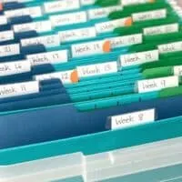 homeschool crate system that holds one year's worth of curriculum organized by week