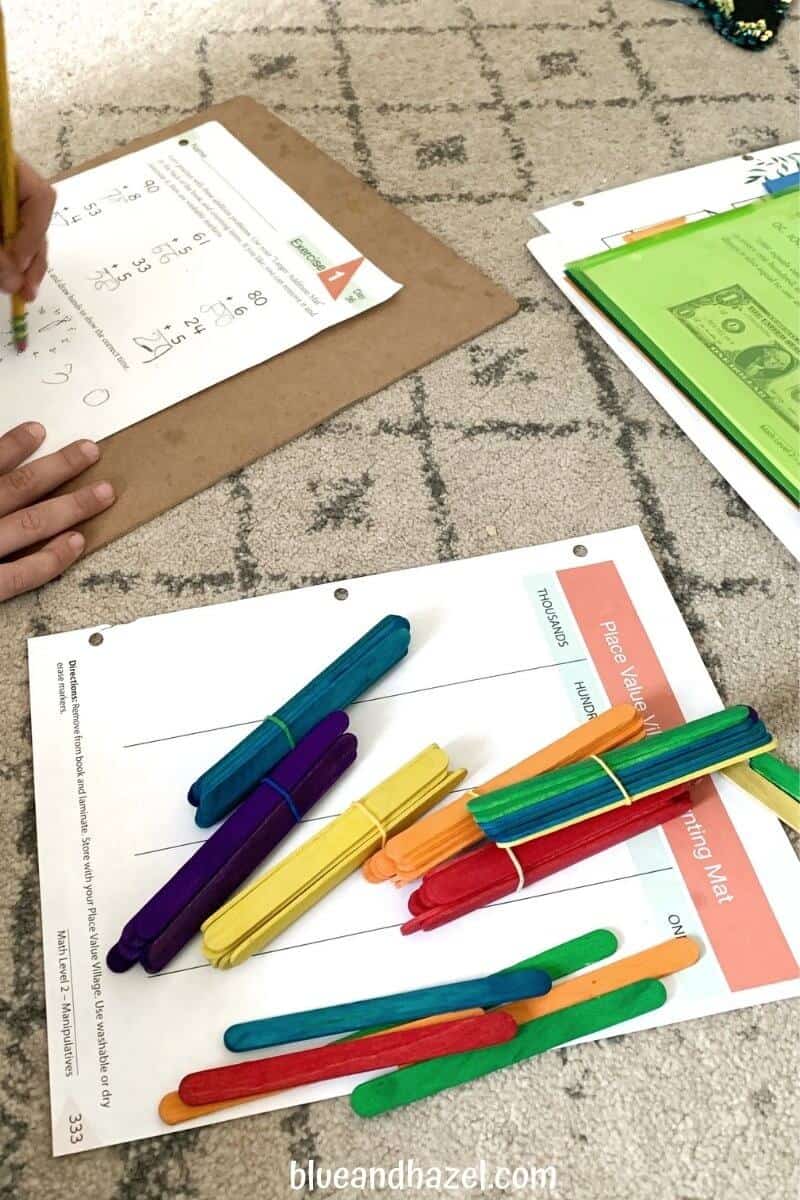 Sets of 10 popsicle sticks wrapped with rubberbands to practice place value. 