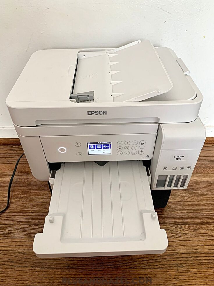 White Epson Ecotank printer model ET-3760 with the top copy sheet feeder ready to be used. 