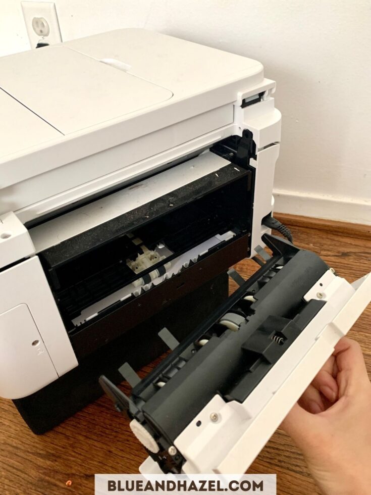 fixing a paper jam for my color printer for homeschooling