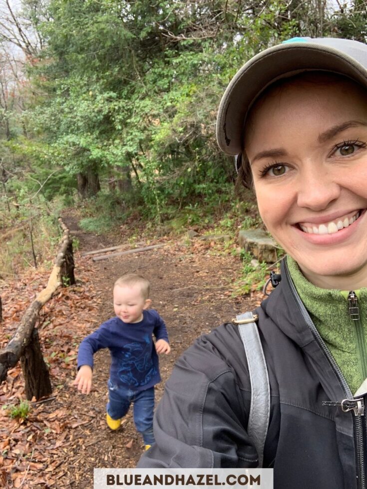 A mom on a nature walk with her toddler