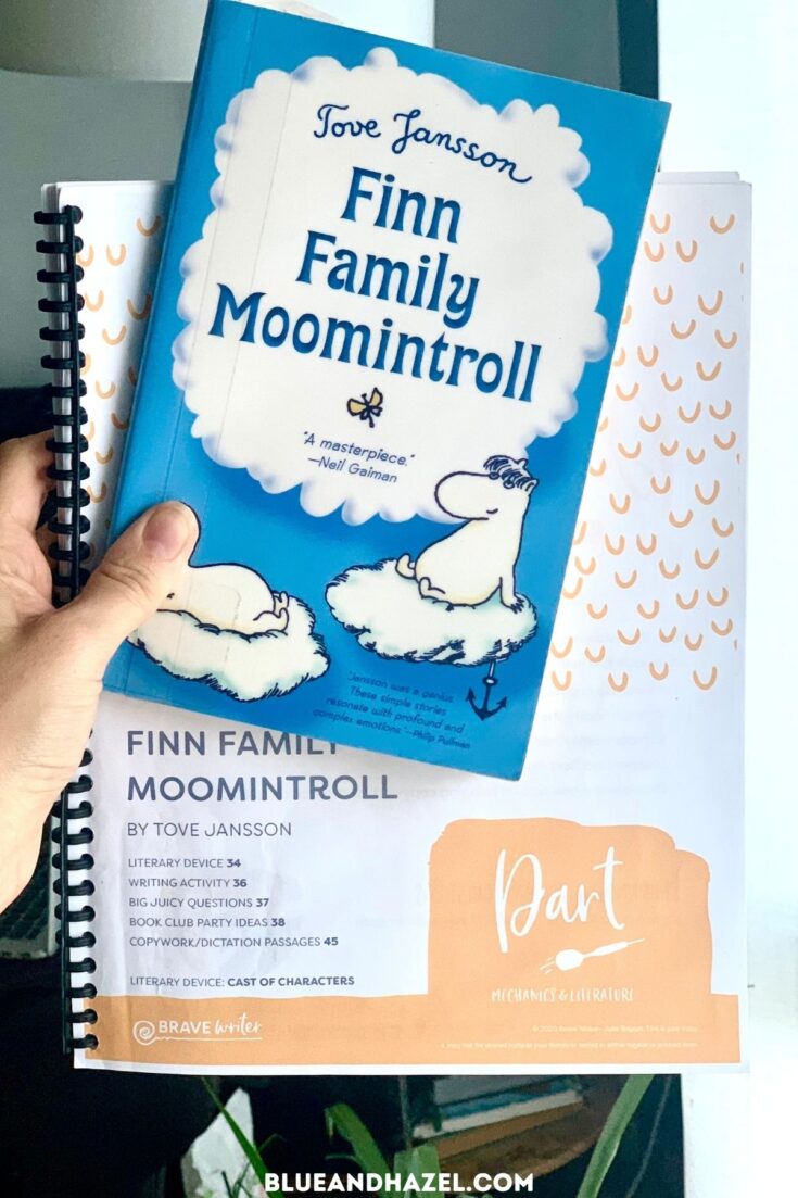 Finn Family Moomintroll book next to it's matching Dart by Brave Writer, a homeschool language arts and writing curriculum.