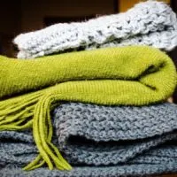 green, gray, and white blankets for napping