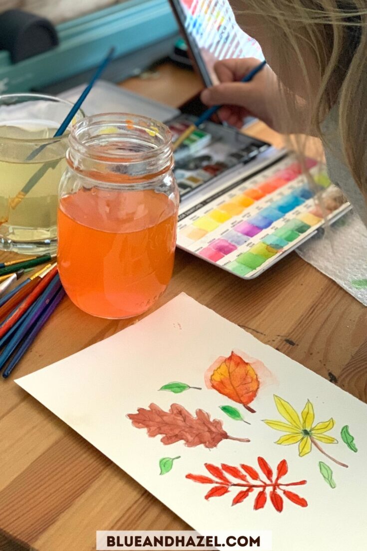 Fall leaves watercolored onto watercolor paper by a 1st grade girl. 