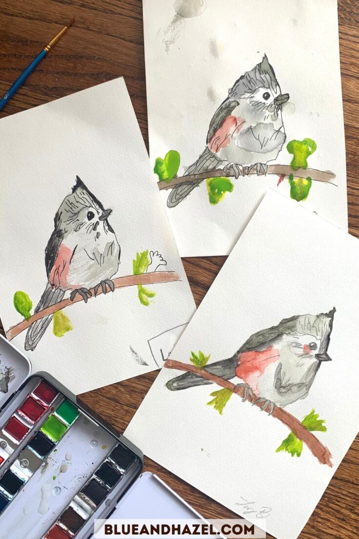 3 watercolor paintings of the same bird painted by kids and a mom while homeschooling. 