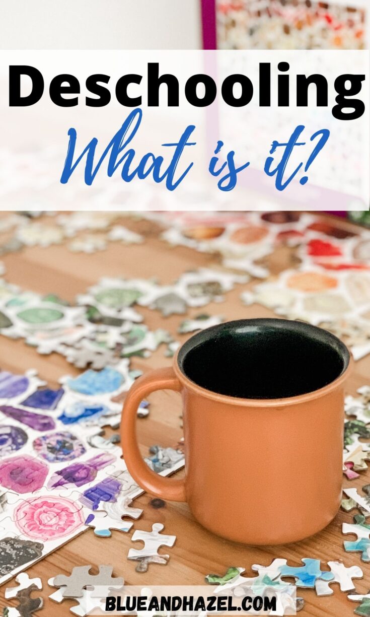 A ceramic mug on a table with a puzzle in progress during deschooling. 