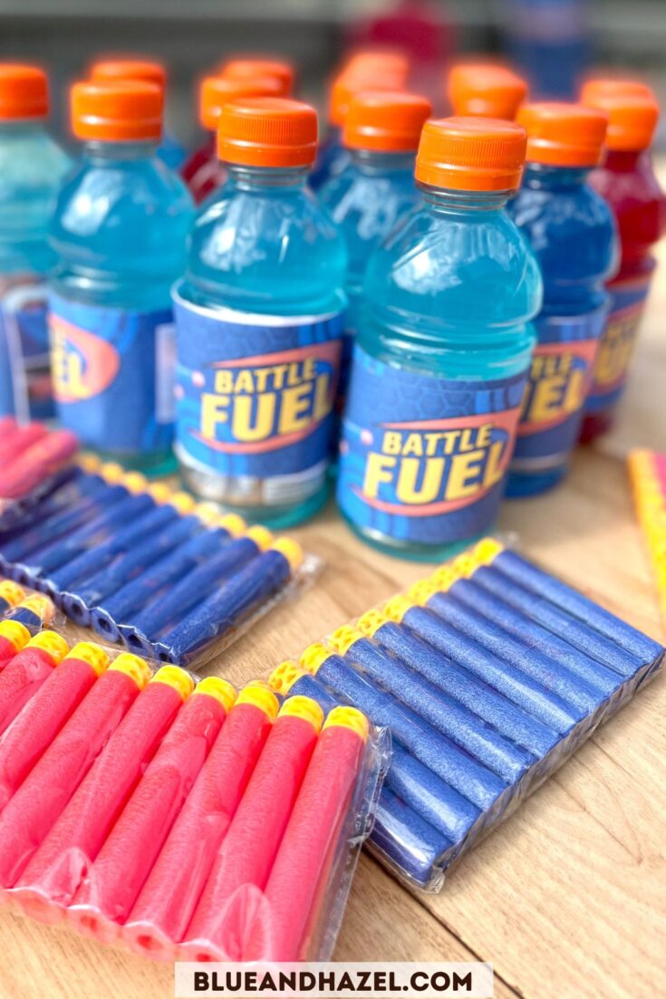 Battle fuel covers on gatorade bottles made the cutest Nerf party decorations for my 9 year old's birthay, along with packs of new soft tipped darts on the table. 