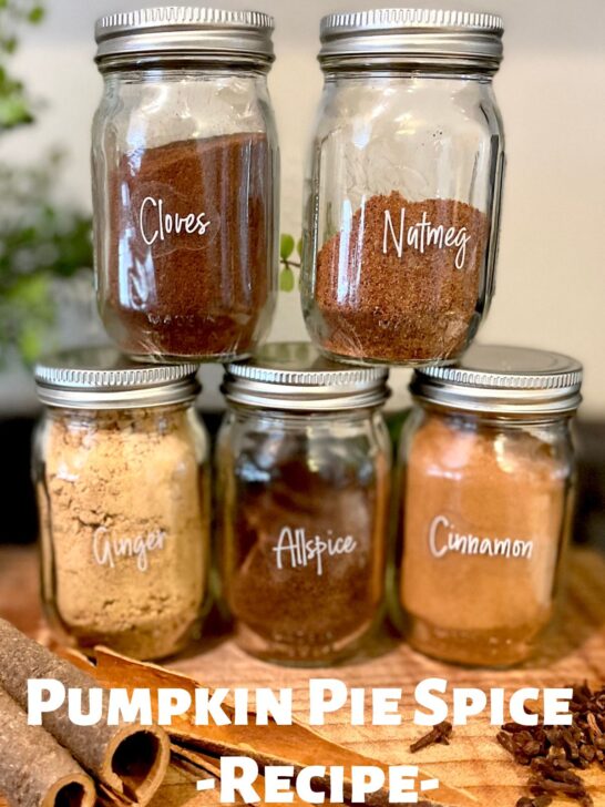 5 spices included in pumpkin pie spice including jars of cinnamon, allspice, ginger, nutmeg, and cloves.