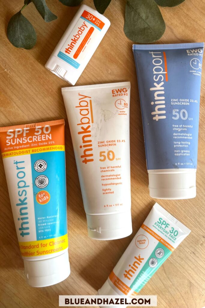 Thinksport and Think baby sunscreens on a table being compared.