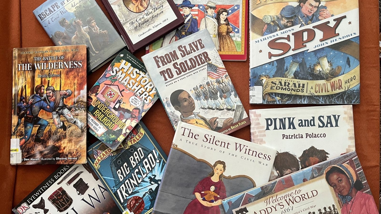 Civil War Books For Kids scattered around on a table